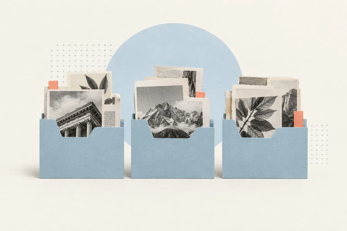 Paper articles organized into three pale blue folders